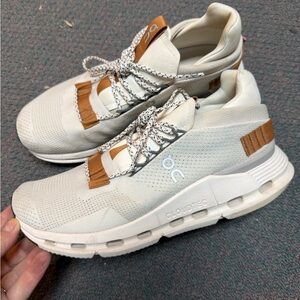 On Running Cream and Brown Athletic Shoes